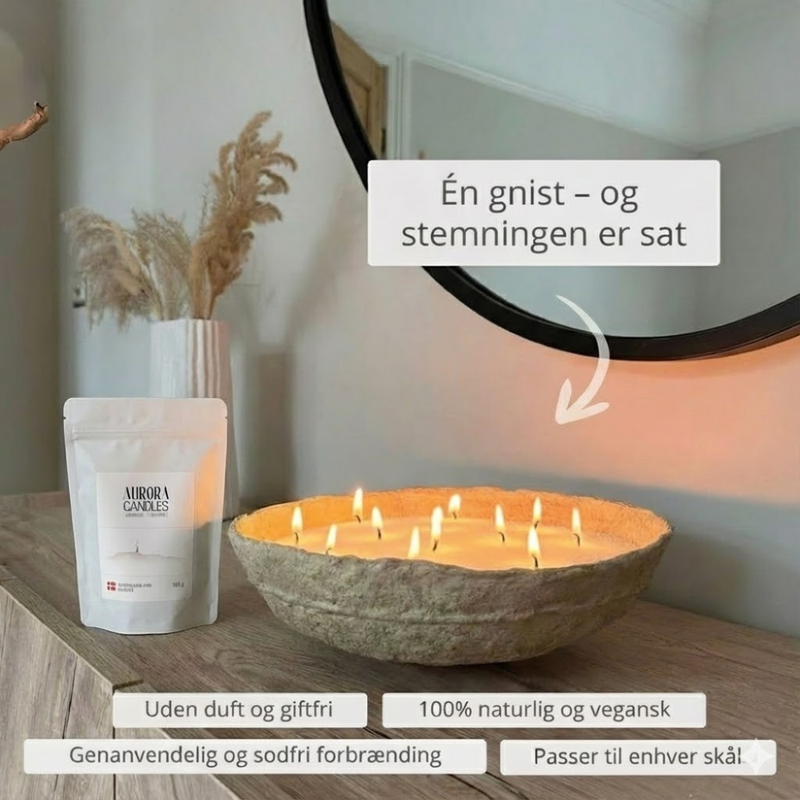 Aurora Candles emballage med et tændt lys på en hvid overflade.
